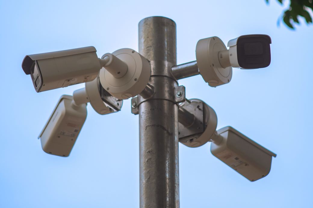 Four CCTV cameras on a steel pole